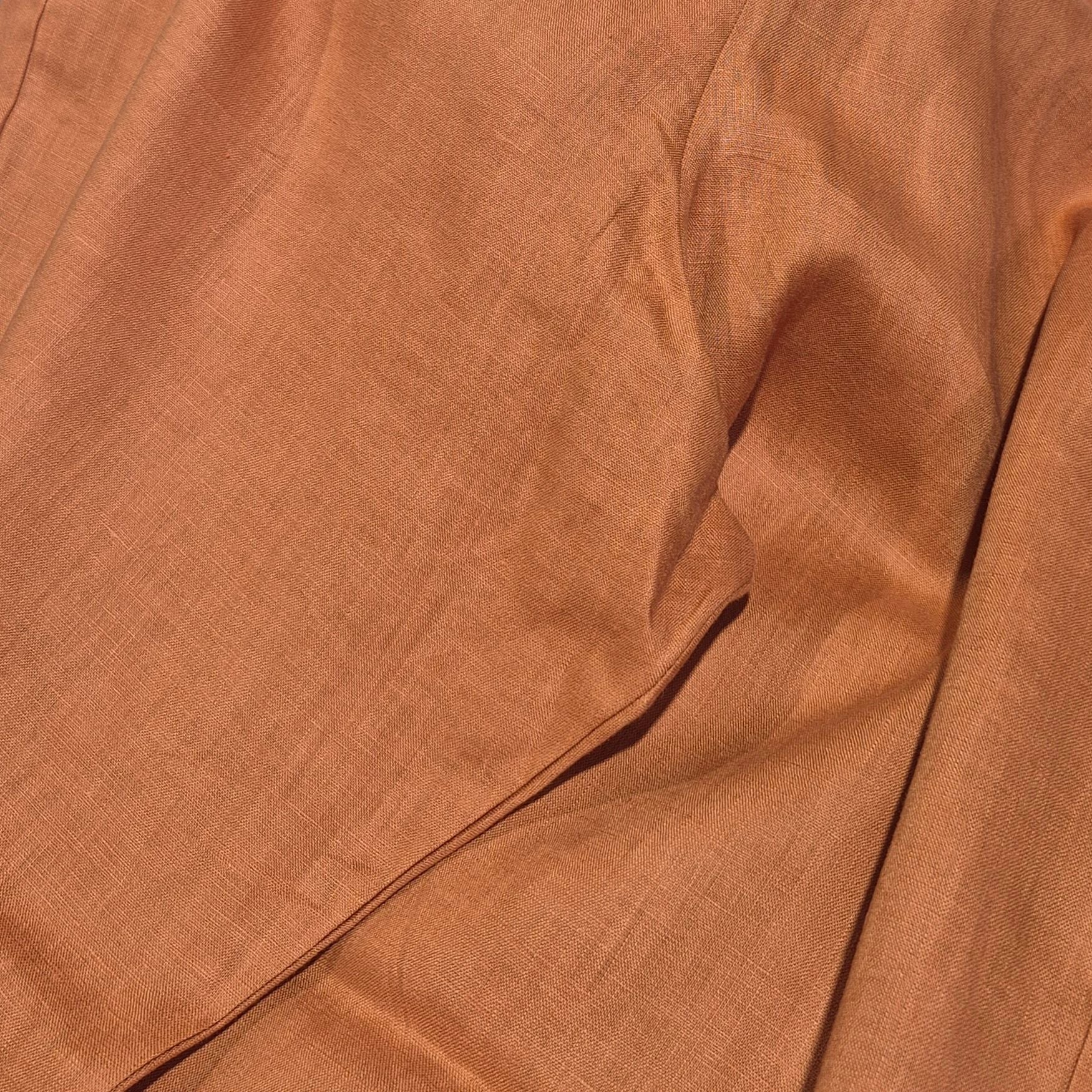 Close-up of brown fabric with visible texture