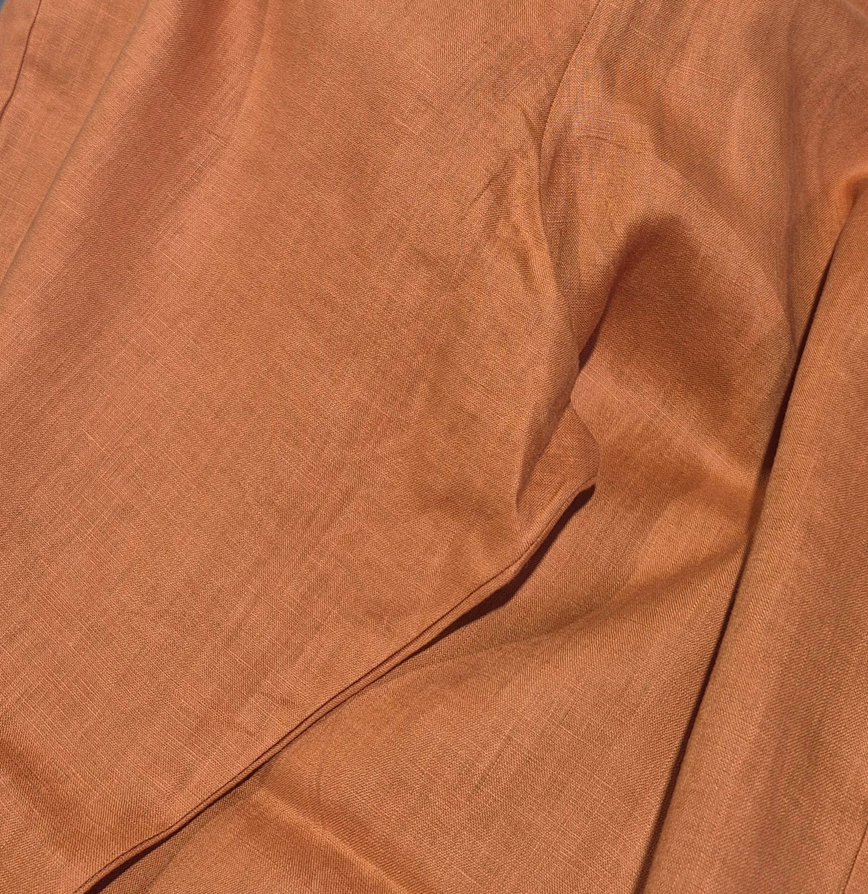 Close-up of brown fabric with visible texture