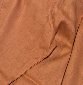 Close-up of brown fabric with visible texture