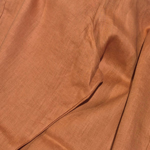 Close-up of brown fabric with visible texture