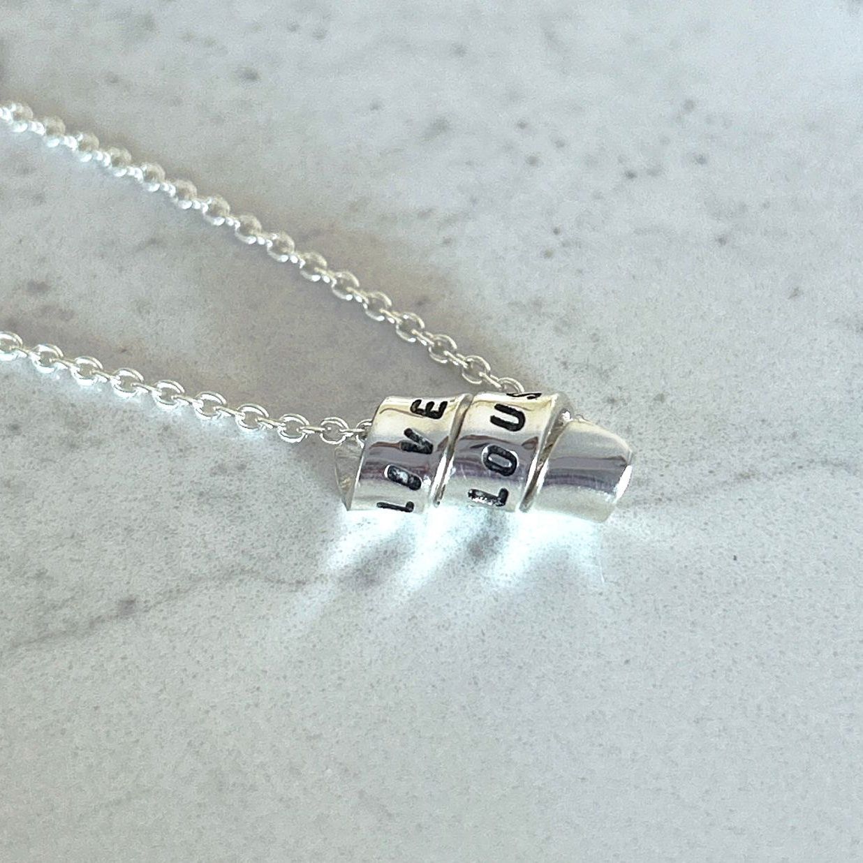 Secret Message Ribbon Pendant by Lynda Marion for Positano Lifestyle Boutique